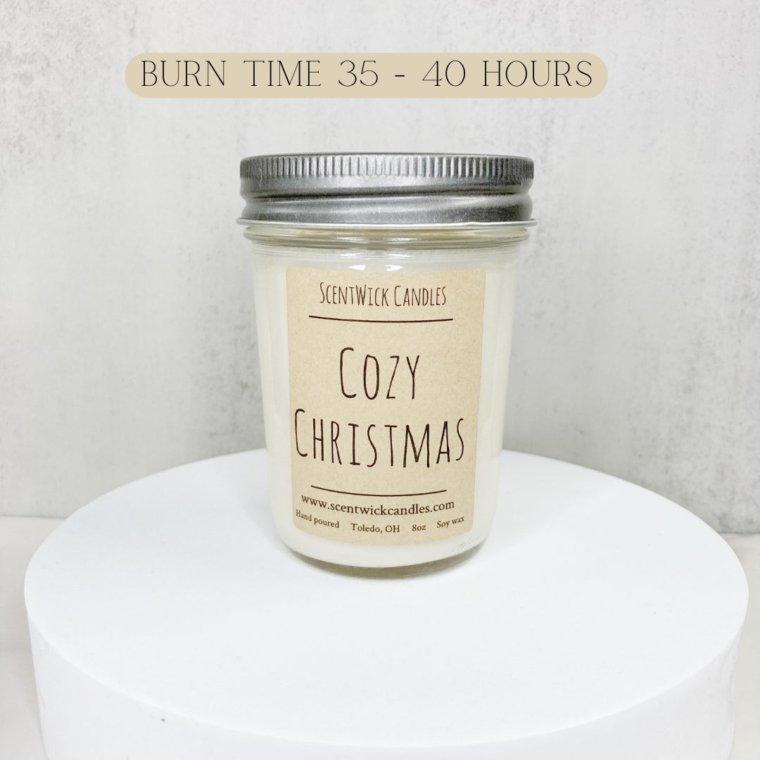 A graphic showing that our handmade natural soy wax Cozy Christmas candle has a burning time around 35 to 40 hours. 