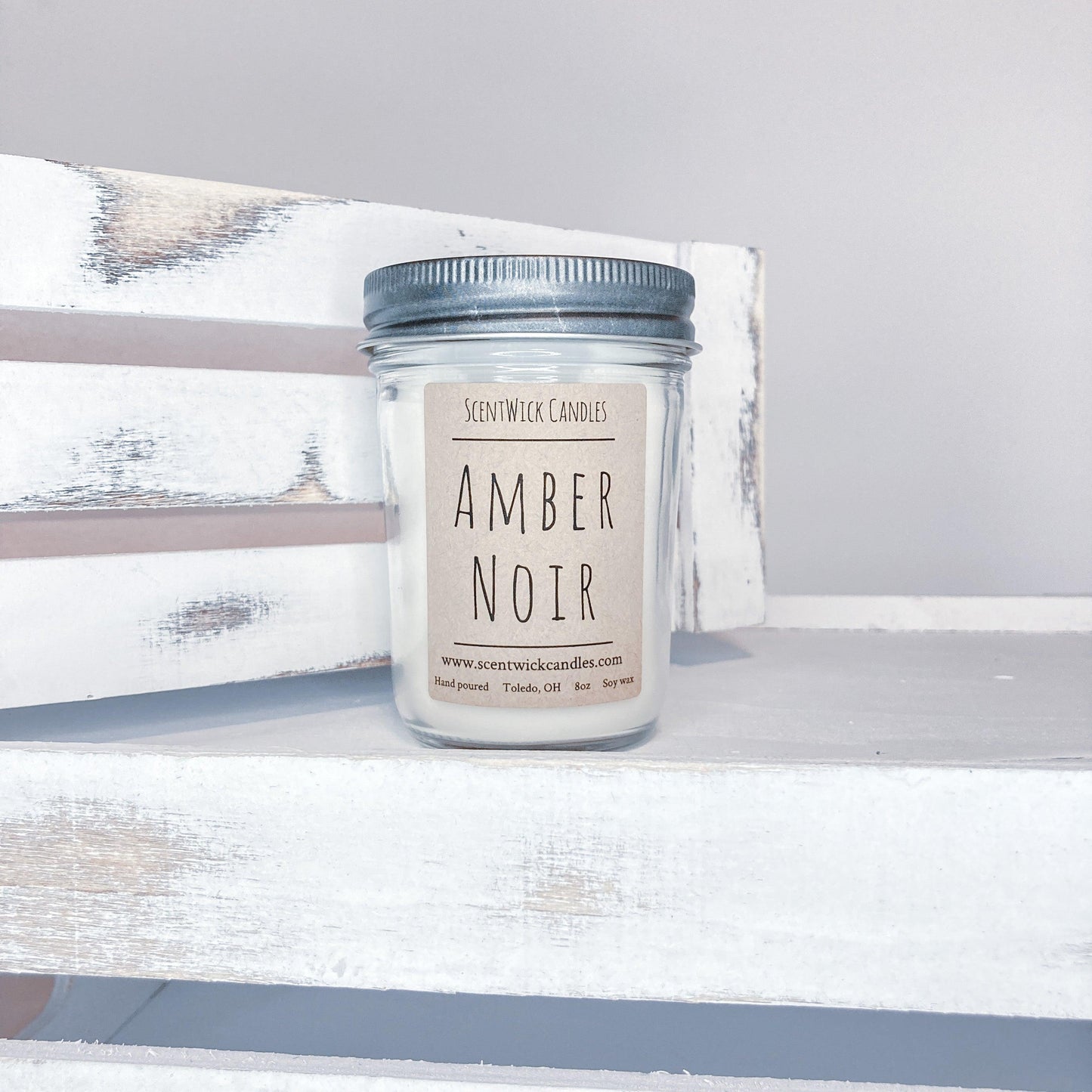 Amber Noir handmade soy candle in 8 oz glass jar. Made by ScentWick Candles Toledo Ohio